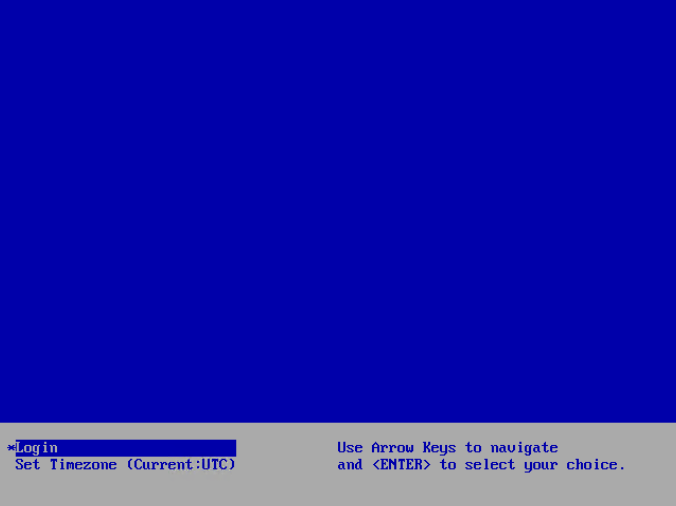 Login screen with a blue background and options to set the timezone, along with instructions to use arrow keys for navigation.